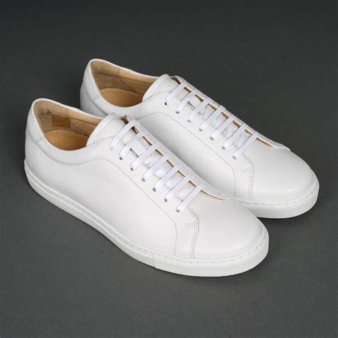 white leather sneakers